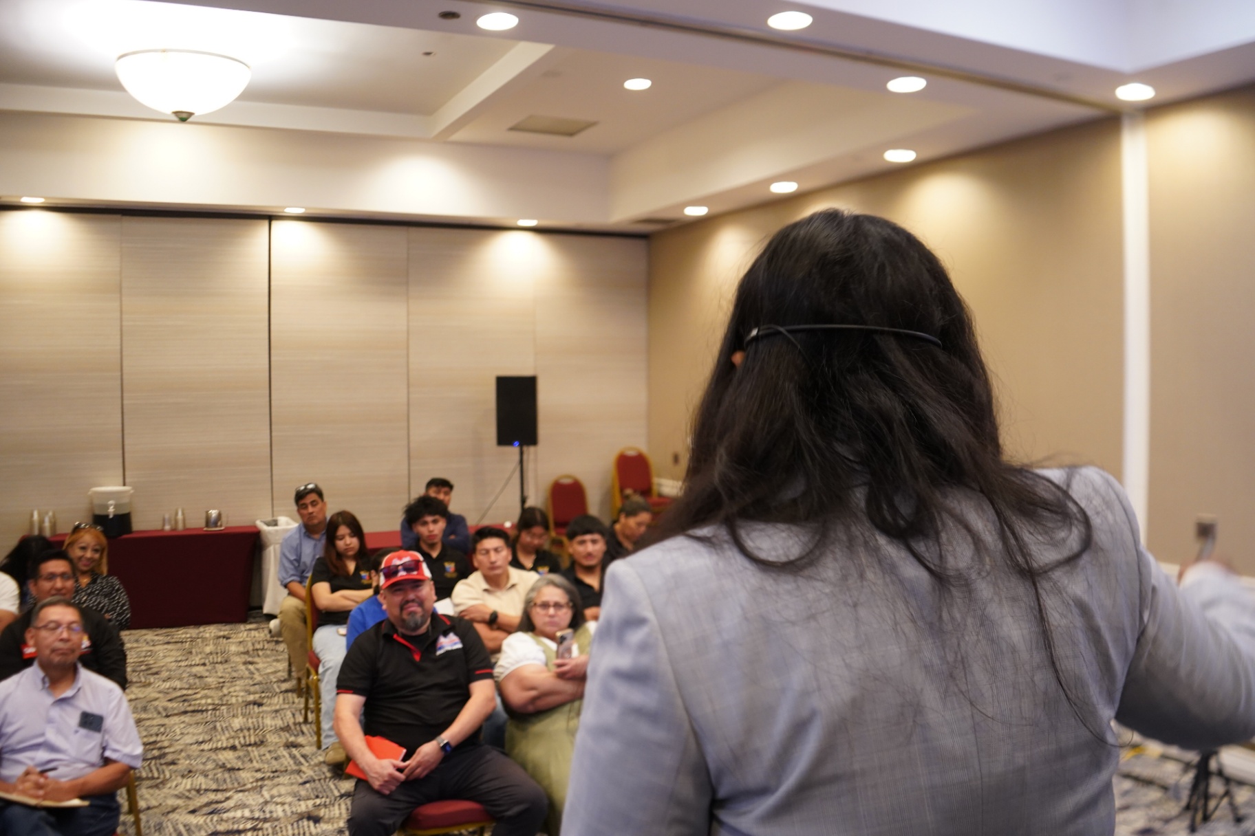 Joselin Terrazas addressing the audience at the Insurance Contractor Tour